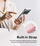 Galaxy Z Flip 6 / 5 / 4 / 3 | Hinge Cover - Person holding a phone with a pink polyester webbing strap and metal ring.