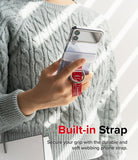 Galaxy Z Flip 7 FE / 6 / 5 / 4 / 3 | Hinge Cover Tarpaulin - Hand holding a phone with a red Danger-themed strap.