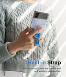Galaxy Z Flip 7 FE / 6 / 5 / 4 / 3 | Hinge Cover Tarpaulin - Hand holding a foldable phone with a blue danger-themed strap.