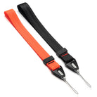 Hand Strap | Black / Neon Orange - Two nylon wrist straps in neon orange and black with black plastic connectors and thin loops.