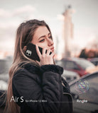 iPhone 12 Mini Case | Air-S - Woman talking on an iPhone 12 Mini with a black Air-S case in an outdoor urban setting.
