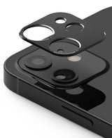 iPhone 12 Mini | Camera Styling - A black protective camera lens cover hovering above the dual-lens array of a black iPhone.