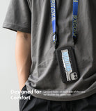 iPhone 12 Mini Case | Fusion-X Design - Person wearing a black phone case with a blue lanyard around their neck.