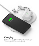 iPhone 12 Pro Max Case | Fusion-X Design - iPhone and AirPods Pro charging wirelessly on a white charging pad.
