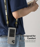 iPhone 12 Pro Max Case | Fusion Design - Person wearing a phone case with a yellow branded lanyard attached to both sides.