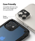 iPhone 12 | Camera Styling - Black camera lens protector hovering over an iPhone 12 with a clear and a Fusion X case.