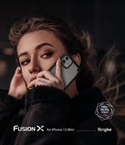 iPhone 12 Mini Case | Fusion-X - Woman holding a black Fusion-X protective case on an iPhone 12 Mini against her ear.