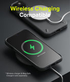 iPhone 13 Mini Case | Onyx - Black phone case on a wireless charger showing a 69% charge icon on the screen.