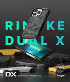 iPhone 13 Pro Max Case | DX - Black camouflage iPhone 13 Pro Max case floating above a desk with other cases and branding.