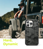 iPhone 13 Pro Max Case | DX - Black camo phone case displayed next to a man in a Jeep with the text Firm, Hard, Dynamic.