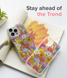 iPhone 13 Pro Max Case | Fusion Design - Two clear phone cases with colorful floral patterns resting on an open magazine.