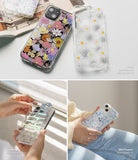 iPhone 13 Pro Max Case | Fusion Design - Three clear phone cases featuring floral and typographic designs displayed on surfaces.