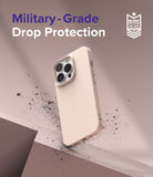 iPhone 13 Pro Case | Air-S - Light pink phone case floating above a surface with dust particles and military-grade protection text.