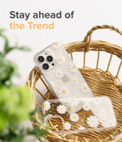 iPhone 13 Pro Case | Fusion Design - Clear phone cases with daisy patterns resting inside a woven wicker basket.