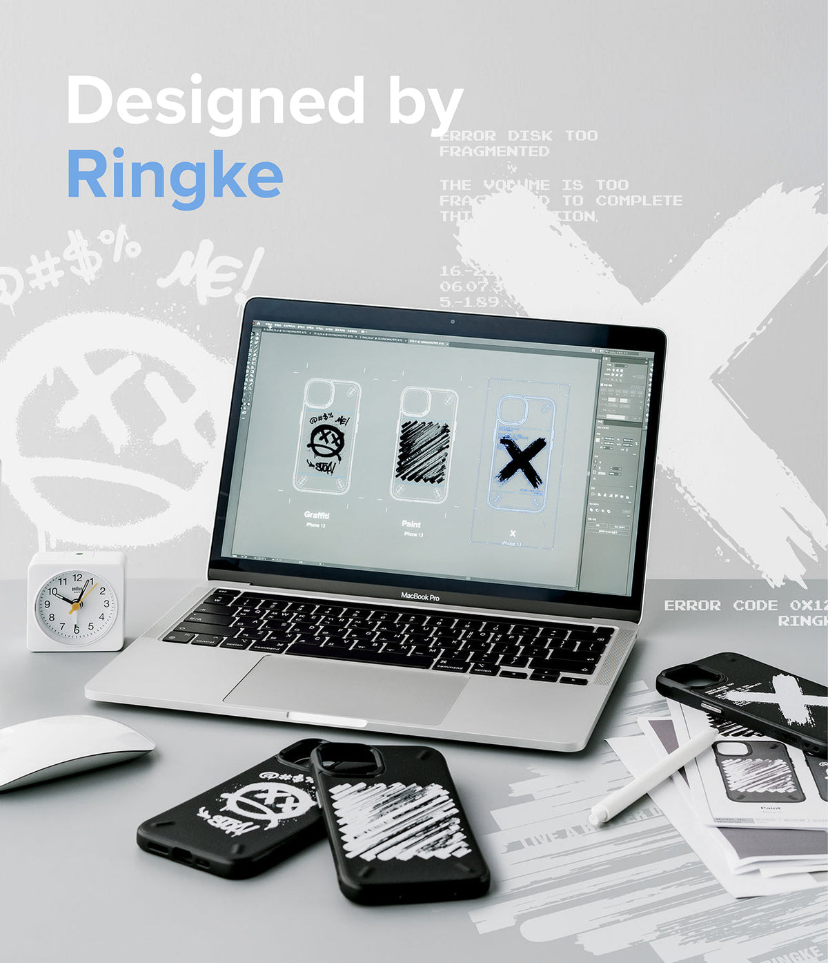iPhone 13 Pro Case | Onyx Design - Laptop screen showing phone case designs with physical cases on a desk.
