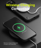 iPhone 13 Pro Case | Onyx - Black phone case on a wireless charger showing a green charging icon and 69% battery status.