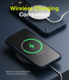 iPhone 13 Pro Case | Onyx - Two dark blue iPhone 13 Pro cases charging wirelessly on a flat surface with a green charging icon.