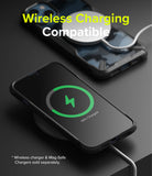 iPhone 13 Case | Fusion-X - iPhone 13 in a camo Fusion-X case wirelessly charging with a MagSafe charger and charging icon.