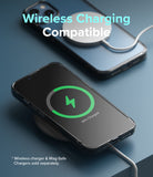iPhone 13 Case | Fusion - iPhone 13 in a clear case wirelessly charging with a green battery icon displayed on the screen.