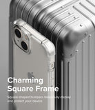 iPhone 14 Plus Case | Fusion Bumper - Clear square-frame phone case resting against a metallic silver suitcase.