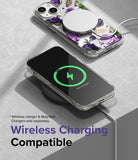 iPhone 14 Plus Case | Fusion Design - Floral phone case with MagSafe charger and phone wirelessly charging on a pad.