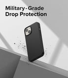 iPhone 14 Plus Case | Silicone - Black phone case hovering over a concrete edge with text reading Military-Grade Drop Protection.