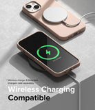iPhone 14 Plus Case | Silicone - Two beige silicone iPhone cases, one charging via MagSafe and one on a wireless pad.
