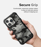 iPhone 14 Pro Max Case | Fusion-X - Hand holding a phone with a black and white camo patterned protective case.