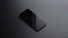 iPhone 14 Pro Max Screen Protector | Privacy Glass - A smartphone screen darkens as it rotates to demonstrate privacy.