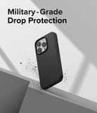 iPhone 14 Pro Max Case | Silicone - Black silicone phone case hovering above a concrete edge with debris and text overlay.