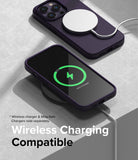 iPhone 14 Pro Max Case | Silicone - Two dark purple iPhones in silicone cases charging wirelessly on a textured surface.