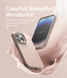 iPhone 14 Pro Max Case | Silicone - Beige silicone phone case floating amidst a splash of matching liquid.