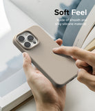 iPhone 14 Pro Max Case | Silicone - Hand holding a beige silicone phone case with text overlay reading Soft Feel.