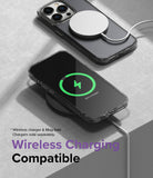 iPhone 14 Pro Case | Fusion Matte - iPhone 14 Pro in a matte case charging wirelessly with a MagSafe puck and pad.