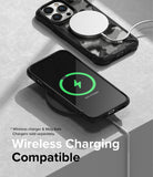 iPhone 14 Pro Case | Fusion-X - iPhone 14 Pro in a black Fusion-X case charging wirelessly on a pad and with a MagSafe charger.