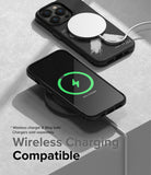 iPhone 14 Pro Max Case | Onyx Design - Two black phone cases on a gray surface, one charging wirelessly with a MagSafe puck.