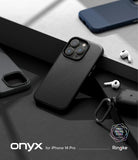 iPhone 14 Pro Case | Onyx - Matte black textured iPhone 14 Pro case on a dark surface with wireless earbuds and accessories.