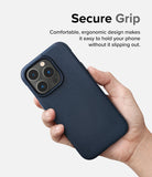 iPhone 14 Pro Case | Onyx - A hand holding a dark blue textured iPhone 14 Pro case against a light background.
