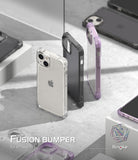 iPhone 14 Case | Fusion Bumper - Three clear and colored Fusion Bumper cases for iPhone 14 displayed on a concrete surface.