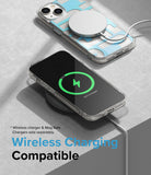 iPhone 14 Case | Fusion Design - iPhone 14 with a patterned case charging wirelessly via MagSafe and a flat charging pad.
