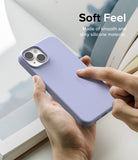 iPhone 14 Case | Silicone - Hand holding a smooth, light purple silicone iPhone 14 case with text reading Soft Feel.