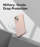 iPhone 14 Case | Silicone - A light pink iPhone 14 case resting on a grey geometric surface with debris, text reads Military-Grade Drop Protection.
