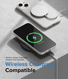 iPhone 14 Case | Slim - iPhone 14 in a slim case charging wirelessly with a MagSafe puck and a wireless charging pad.