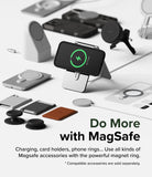 iPhone 15 Pro Max Case | Alles - A phone charging on a stand surrounded by various MagSafe accessories on a white surface.