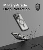 iPhone 15 Pro Max Case | Fusion Bold Magnetic - Two phone cases falling toward a cracked surface with debris.