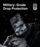 iPhone 15 Pro Max Case | Fusion-X - Camouflage phone case on a jagged rock with military-grade drop protection text.