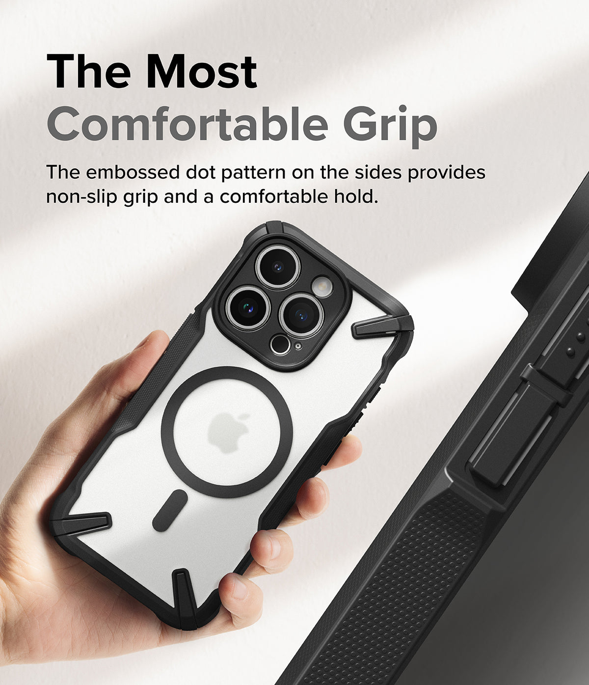 iPhone 15 Pro Max Case | Fusion-X Magnetic Matte Black - iPhone 15 Pro Max Case - Hand holding a matte black phone case with a magnetic ring and textured side grip pattern.