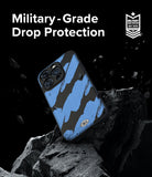 iPhone 15 Pro Max Case | Onyx Design - Blue and black abstract patterned phone case floating above jagged rocks.