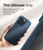 iPhone 15 Pro Max Case | Onyx - Hand holding a navy phone case with a textured micro-dot grip pattern on the side edges.