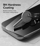 iPhone 15 Pro Max Screen Protector | Full Cover Glass - iPhone 15 Pro Max Screen Protector - A metal key resting on a smartphone screen protector, demonstrating 9H scratch resistance.